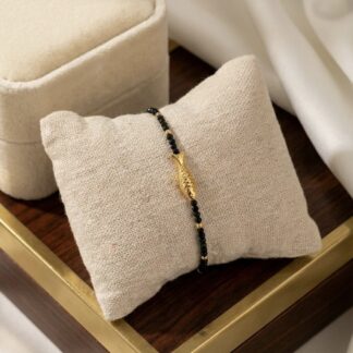 Bracelet poisson et perles noires acier inoxydable