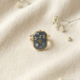 Bague ajustable rétro bleue et fleurs séchées blanches