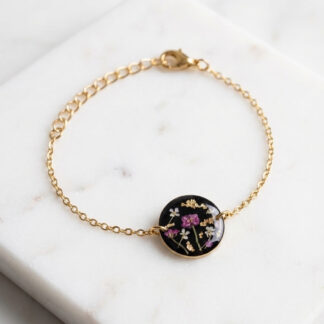 Bracelet rond noir et fleurs séchées roses et blanches
