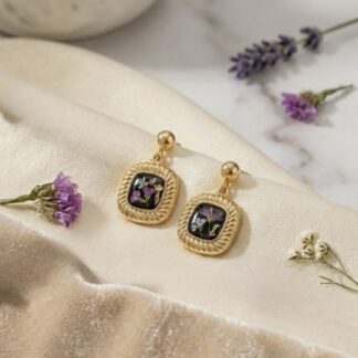 Boules rétro carrées noires fleurs séchées roses et blanches