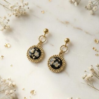Boucles les rétro rondes noires fleurs blanches et feuille d’or