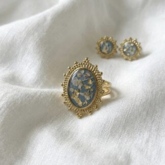 Bague rétro bleue turquoise et fleurs séchées blanches