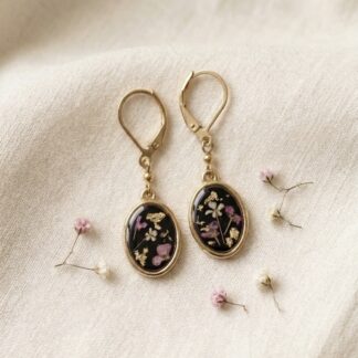 Boucles noires et dorées fleurs séchées roses