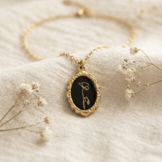 Collier médaillon rétro noir et fleur dorée